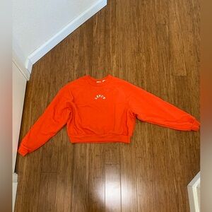 Levi’s Orange sweatshirt. Women’s S.